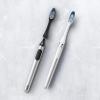 imageOralB Clic Toothbrush Chrome White with 1 Bonus Replacement Brush Head and Magnetic Toothbrush HolderChrome Black