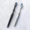imageOralB Clic Toothbrush Chrome White with 1 Bonus Replacement Brush Head and Magnetic Toothbrush HolderOnyx Black
